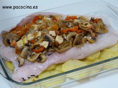 Merluza rellena en salsa de mejillones rellenada Merluza rellena en salsa de mejillones rellenada