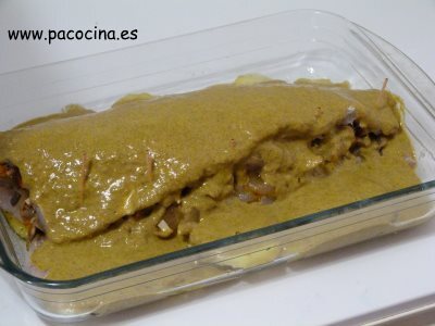 Merluza rellena en salsa de mejillones salseada Merluza rellena en salsa de mejillones salseada