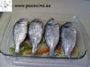 Lubina al horno con patatas panaderas Lubina al horno con patatas panaderas